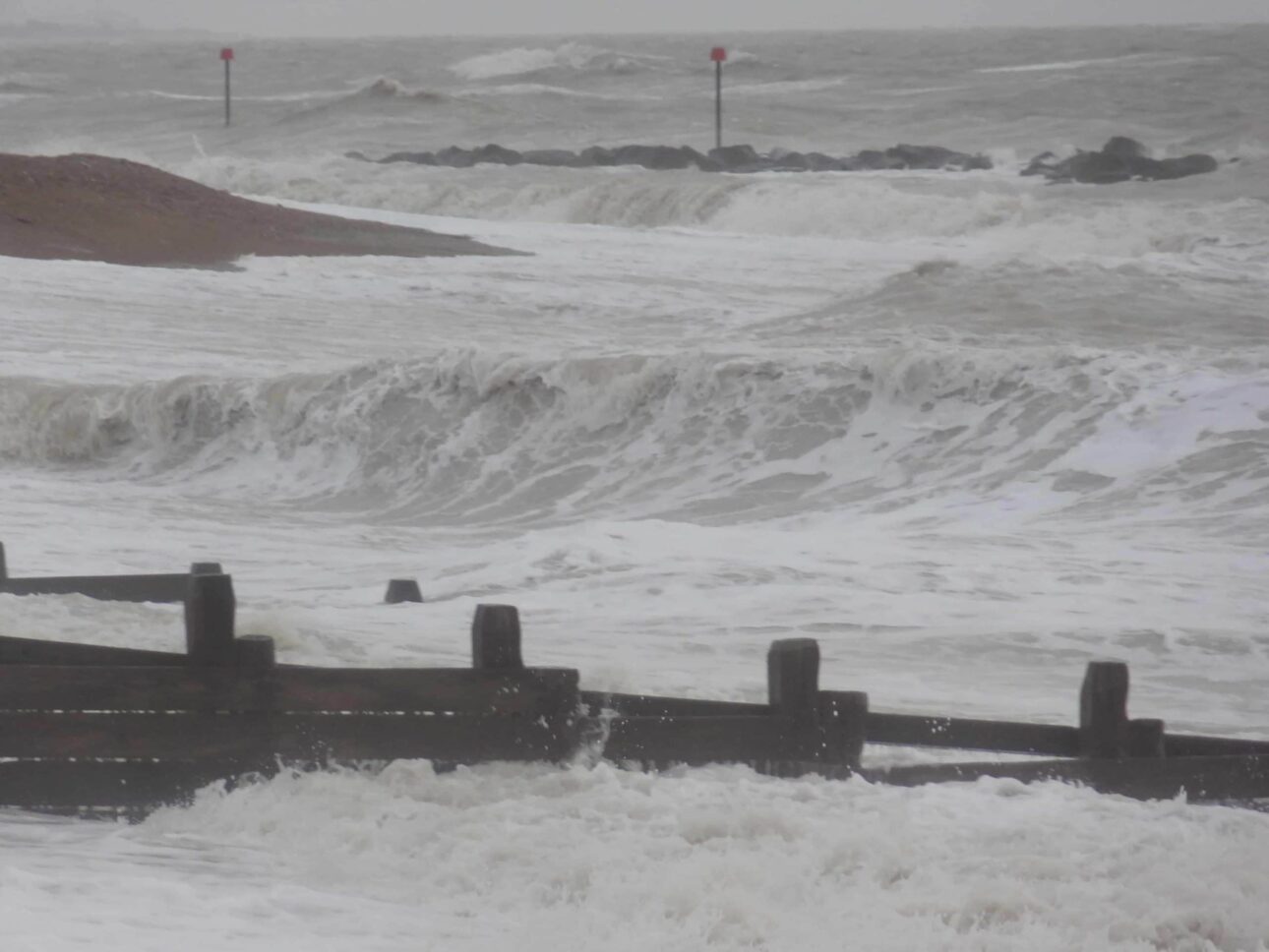 Groynes with heavy waves, West Sussex