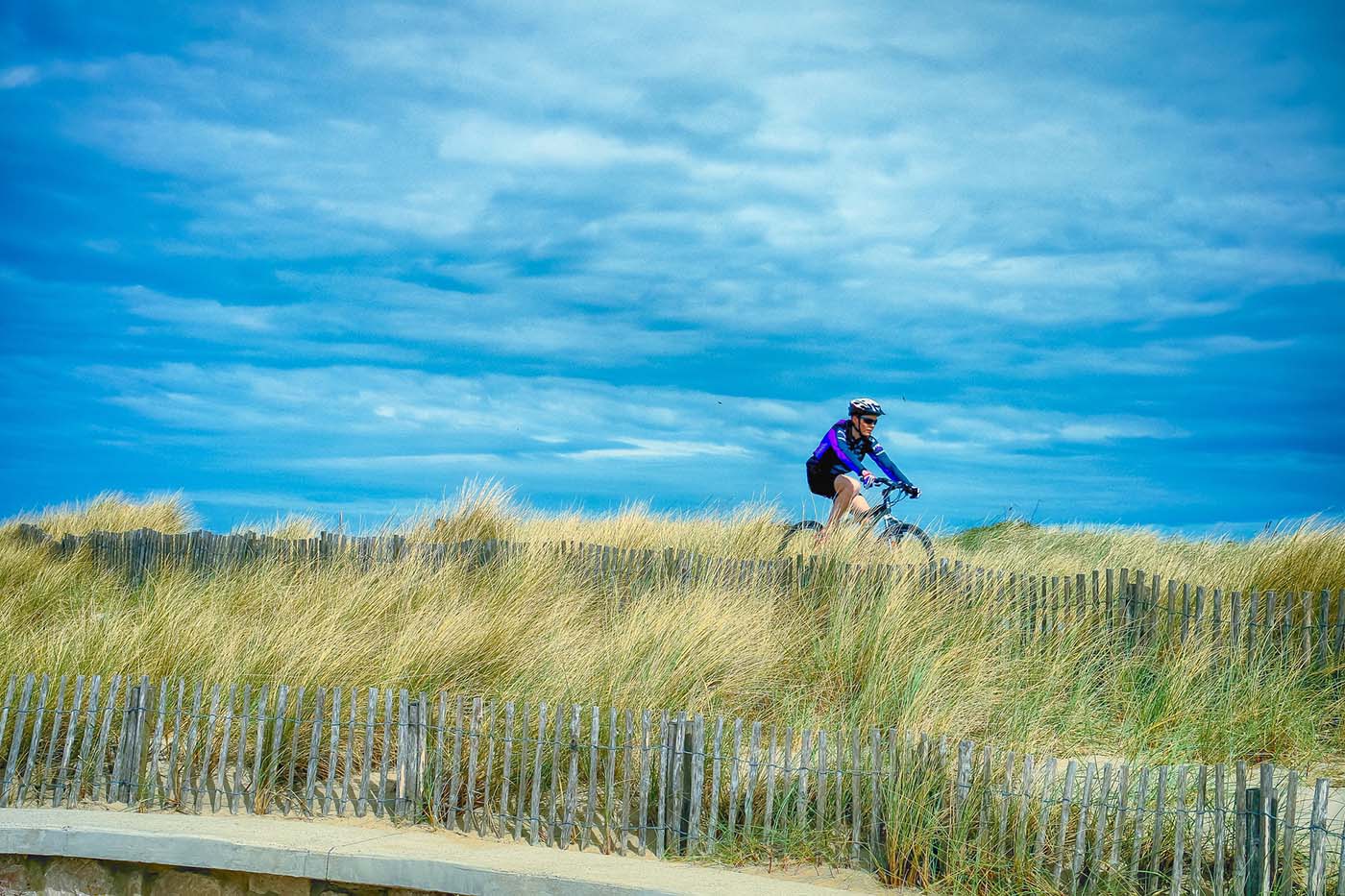 cyclist sand dunes